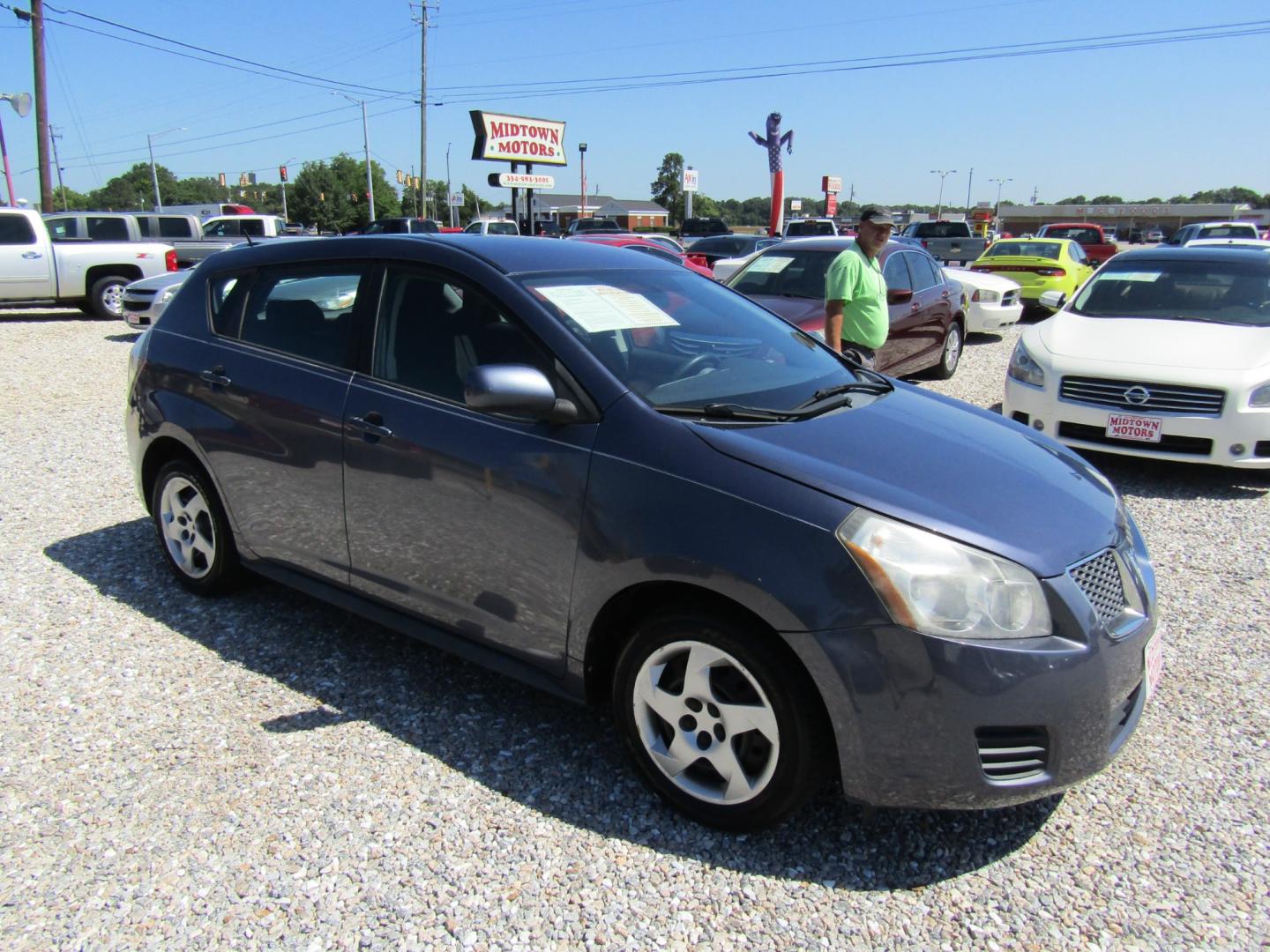 2009 Blue /Gray Pontiac Vibe 1.8L (5Y2SP67819Z) with an 1.8L L4 DOHC 16V engine, 4-Speed Automatic Overdrive transmission, located at 15016 S Hwy 231, Midland City, AL, 36350, (334) 983-3001, 31.306210, -85.495277 - Photo#0